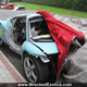 Illustration for article titled Wrecked Ferrari 458 Italias Hide Shame Under Tarps